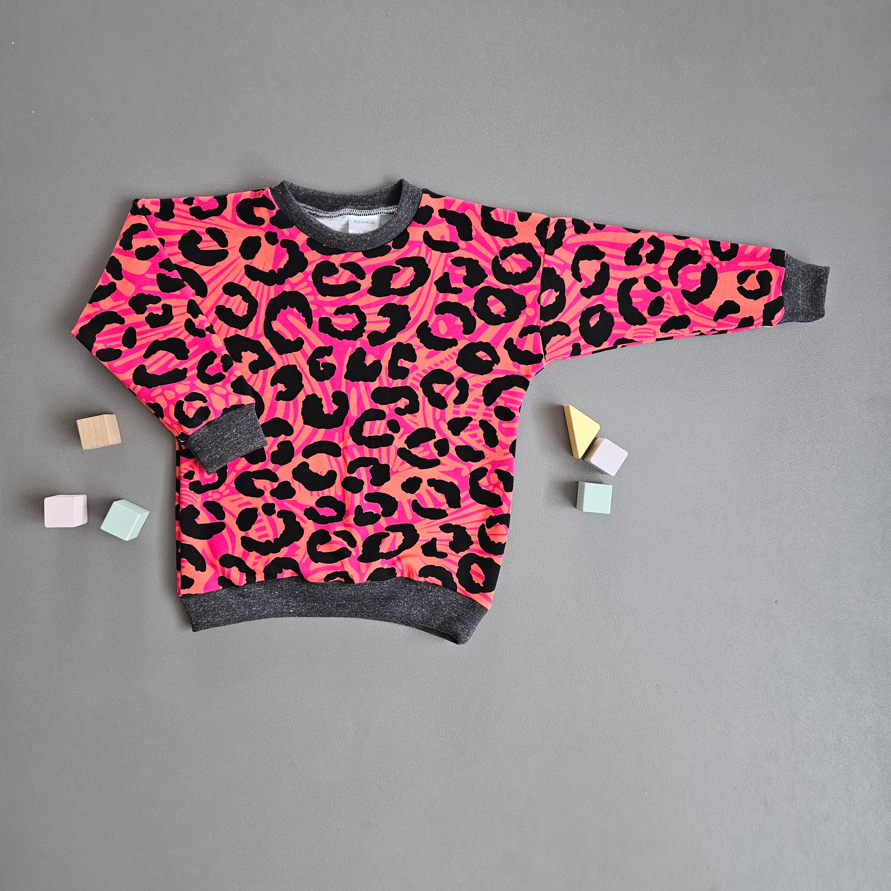Pullover Gr.104 / Leo pink