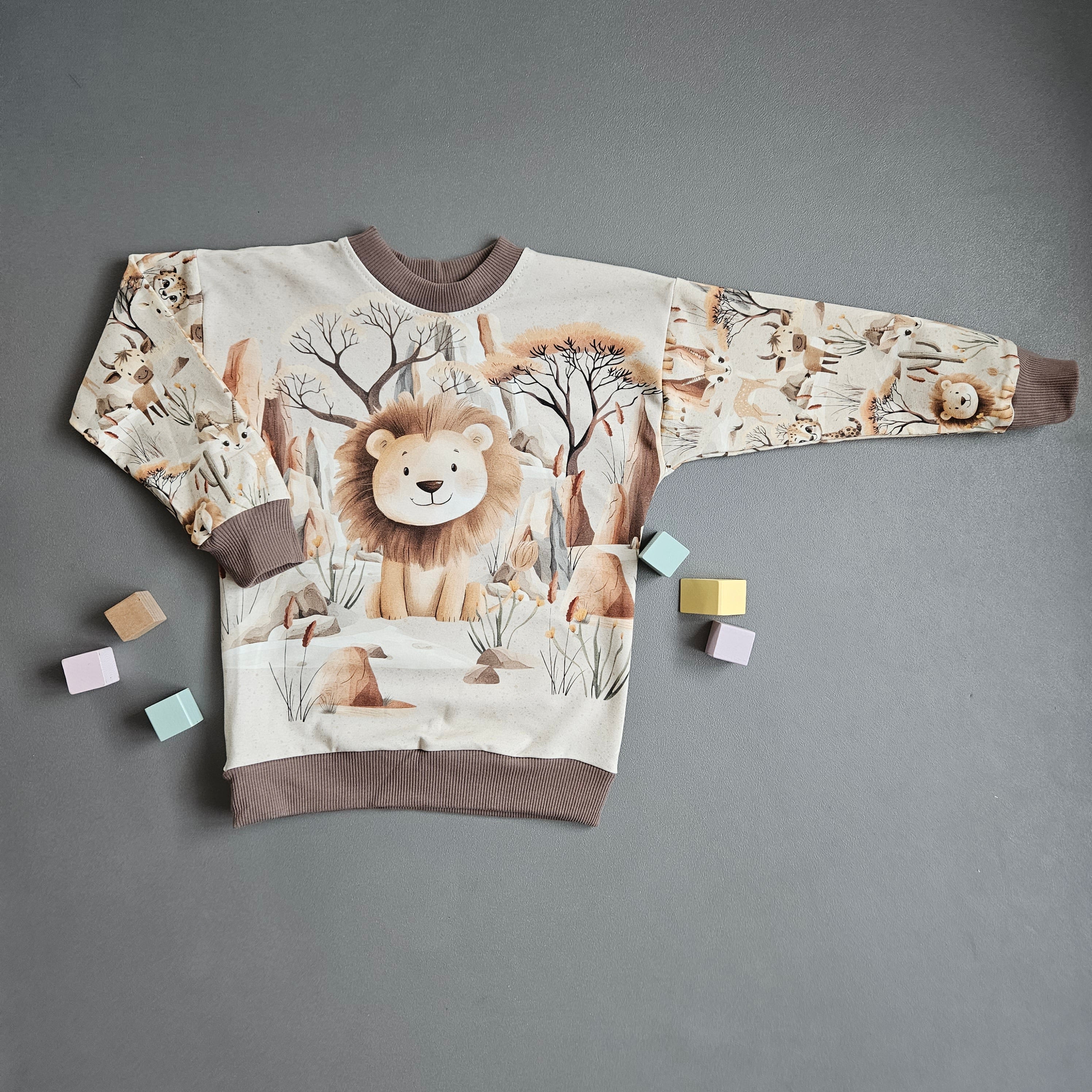 Pullover Gr.110 / Löwe